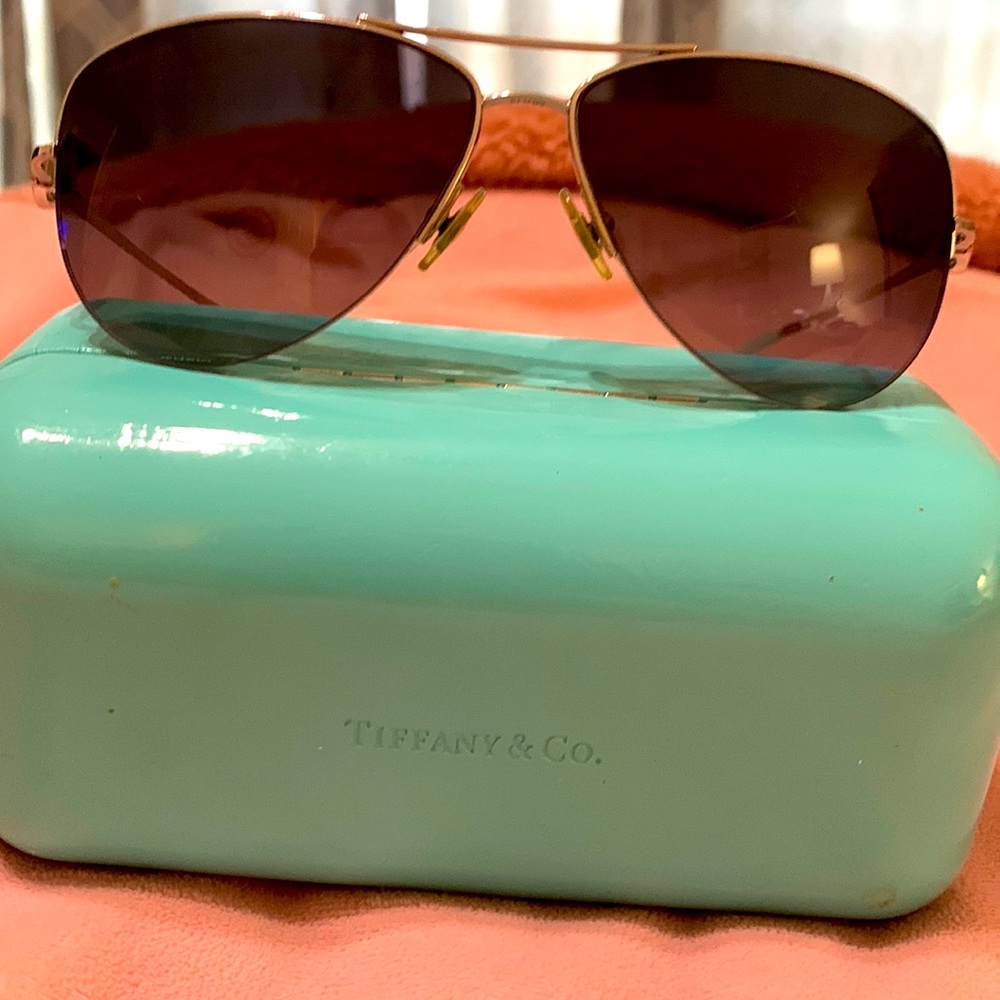 Tiffany and Co. “Victoria” Sunglasses. Case included. A few scratches.